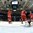 GRAND FORKS, NORTH DAKOTA - APRIL 18: Russia's Danil Lobanov #11, Vladimir Kuznetzov #20, and German Poddubny #22 celebrate a third period goal against Latvia's Gustavs Grigals #29 while Latvia's Markuss Komuls #2 and Regnars Udris #4 look on during preliminary round action at the 2016 IIHF Ice Hockey U18 World Championship. (Photo by Matt Zambonin/HHOF-IIHF Images)

